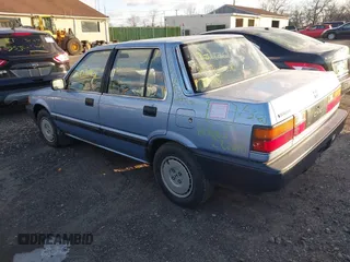 1986 Honda Civic z VIN JHMAK7439GS063929, wystawiony jako IAAI lot #41594413 z przebiegiem Nie podano mil oraz . Historia ofert i sprzedaży dostępna na DreamBid. Obrazek 3.