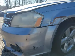 2013 Dodge Avenger SE with VIN 1C3CDZAB5DN662238, listed as a IAAI auction lot 41815308 with 165,278 mi miles and . Bid and sale history available at DreamBid. Image 6.