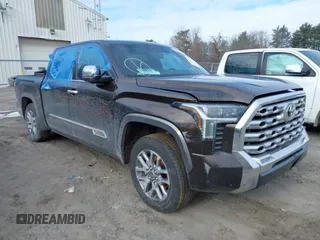 2024 Toyota Tundra 1794 Edition with VIN 5TFMA5DBXRX159104, listed as a IAAI auction lot 41543434 with 28,663 mi miles and . Bid and sale history available at DreamBid. Image 1.