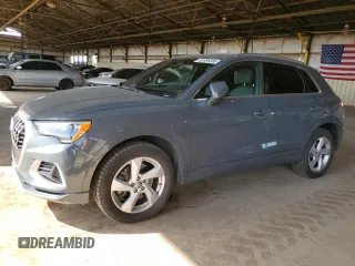 2020 Audi Q3 Premium with VIN WA1AECF34L1034797, listed as a Copart auction lot 51096385 with 74,192 mi miles and Salvage title. Bid and sale history available at DreamBid. Image 1.