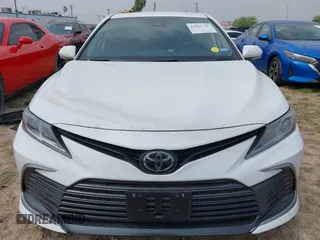 2024 Toyota Camry LE z VIN 4T1R11AK3RU223693, wystawiony jako IAAI lot #41920547 z przebiegiem Nie podano mil oraz . Historia ofert i sprzedaży dostępna na DreamBid. Obrazek 6.
