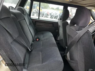 1987 Volvo 740 z VIN YV1FX8843H2178121, wystawiony jako Copart lot #55678015 z przebiegiem 105 881 mil mil oraz Tytuł czysty. Historia ofert i sprzedaży dostępna na DreamBid. Obrazek 10.