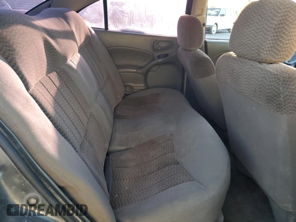 2005 Pontiac Grand Am SE with VIN 1G2NE52E25M135756, listed as a Copart auction lot 79969414 with 128,576 mi miles and Salvage Title. Bid and sale history available at carsss.com. Image 11.