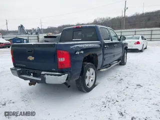 2007 Chevrolet Silverado 1500 LTZ with VIN 2GCEK13M771535698, listed as a IAAI auction lot 41295982 with 216,232 mi miles. Bid and sale history available at carsss.com. Image 4.