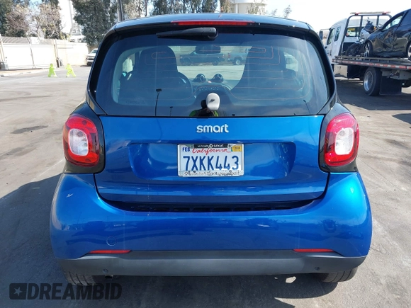 2016 Smart fortwo Passion z VIN WMEFJ5DA4GK067126, wystawiony jako IAAI lot #41559385 z przebiegiem 79 540 mil mil oraz . Historia ofert i sprzedaży dostępna na DreamBid. Obrazek 13.