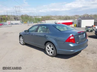2012 Ford Fusion SE with VIN 3FAHP0HAXCR228318, listed as a IAAI auction lot 42048711 with 76,700 mi miles. Bid and sale history available at carsss.com. Image 3.