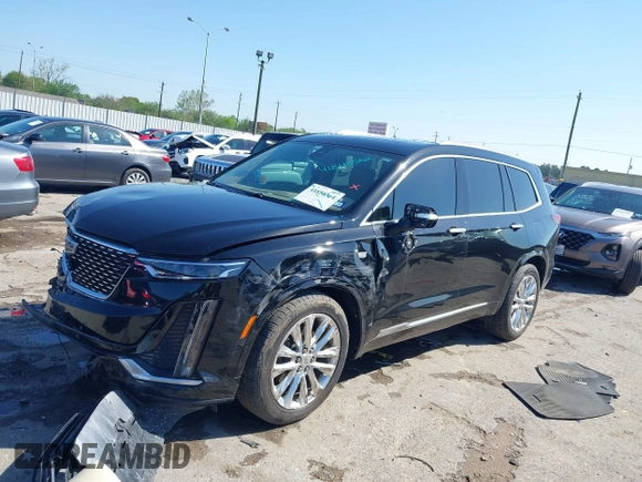 2020 Cadillac XT6 FWD Premium Luxury z VIN 1GYKPERS0LZ232338, wystawiony jako IAAI lot #41845562 z przebiegiem 86 839 mil mil oraz . Historia ofert i sprzedaży dostępna na DreamBid. Obrazek 17.