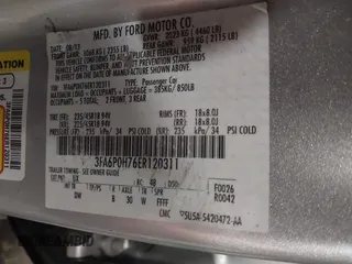 2014 Ford Fusion SE with VIN 3FA6P0H76ER120311, listed as a IAAI auction lot 41593531 with 130,113 mi miles and . Bid and sale history available at DreamBid. Image 9.