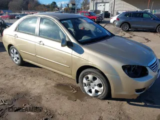 2009 Kia Spectra EX with VIN KNAFE222595666726, listed as a IAAI auction lot 40677796 with 25,305 mi miles. Bid and sale history available at carsss.com. Image 1.