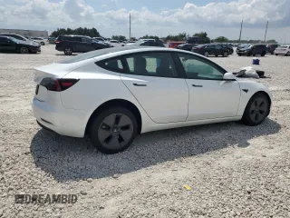 2023 Tesla Model 3 z VIN 5YJ3E1EA1PF608109, wystawiony jako Copart lot #72243744 z przebiegiem 10 165 mil mil oraz Szkoda całkowita • Salvage title. Historia ofert i sprzedaży dostępna na DreamBid. Obrazek 3.
