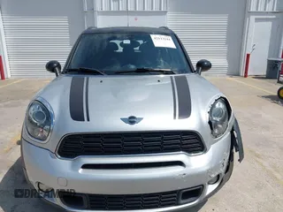 2013 MINI Countryman S z VIN WMWZC3C50DWP21636, wystawiony jako IAAI lot #42113244 z przebiegiem 85 344 mil mil oraz . Historia ofert i sprzedaży dostępna na DreamBid. Obrazek 12.