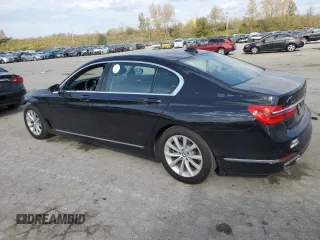 2018 BMW 7 Series 740i xDrive with VIN WBA7E4C54JGV23901, listed as a Copart auction lot 77322824 with 70,922 mi miles and Salvage Title. Bid and sale history available at carsss.com. Image 2.