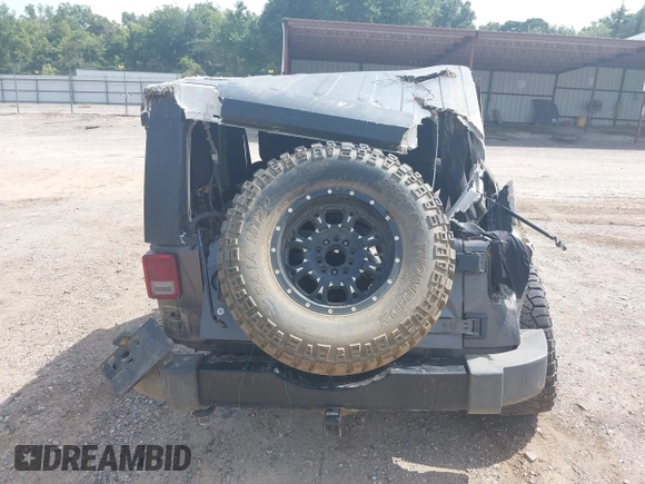 2014 Jeep Wrangler Sport with VIN 1C4AJWAGXEL233647, listed as a IAAI auction lot 39993785 with Not Provided miles and . Bid and sale history available at DreamBid. Image 17.