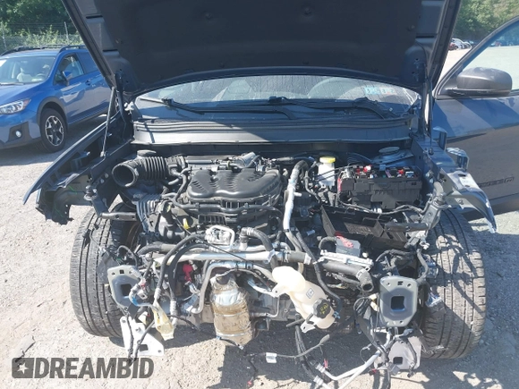 2021 Jeep Cherokee Latitude Lux z VIN 1C4PJMMX8MD205199, wystawiony jako IAAI lot #42556584 z przebiegiem 32 787 mil mil oraz . Historia ofert i sprzedaży dostępna na DreamBid. Obrazek 10.