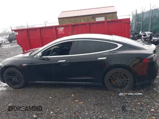 2014 Tesla Model S 60 with VIN 5YJSA1H18EFP28053, listed as a IAAI auction lot 41191521 with 82,207 mi miles and . Bid and sale history available at DreamBid. Image 13.