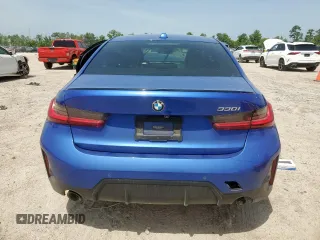 2023 BMW 3 Series 330i with VIN 3MW69FF00P8D04288, listed as a Copart auction lot 57181315 with 35,461 mi miles and Salvage title. Bid and sale history available at DreamBid. Image 6.