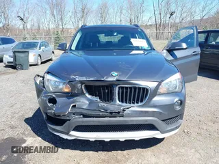 2015 BMW X1 xDrive28i with VIN WBAVL1C59FVY25442, listed as a IAAI auction lot 41854794 with 98,432 mi miles. Bid and sale history available at carsss.com. Image 6.