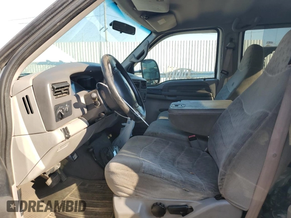 2000 Ford F-350 XL with VIN 1FTSW31F7YED79895, listed as a Copart auction lot 71744804 with 176,241 mi miles and Salvage Title. Bid and sale history available at DreamBid. Image 7.