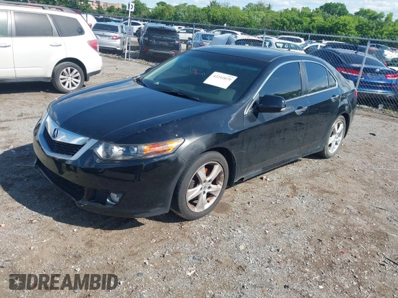 2009 Acura TSX with VIN JH4CU26659C011482, listed as a IAAI auction lot 42212079 with 243,119 mi miles. Bid and sale history available at carsss.com. Image 2.