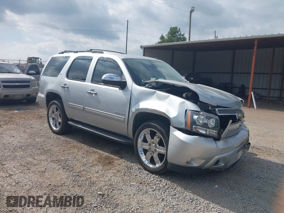 2012 Chevrolet Tahoe LT with VIN 1GNSKBE03CR124911, listed as a IAAI auction lot 40066894 with 151,551 mi miles and . Bid and sale history available at DreamBid. Image 1.