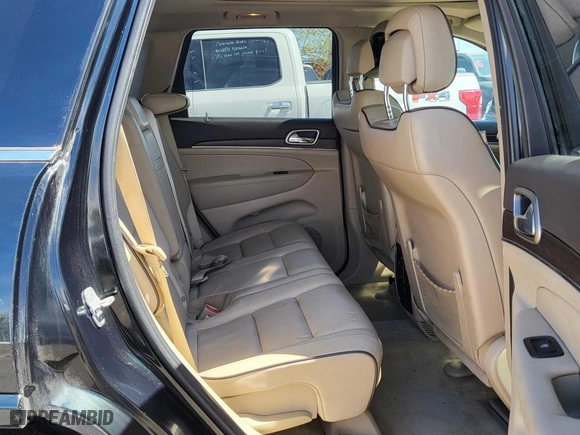 2014 Jeep Grand Cherokee Overland with VIN 1C4RJFCT7EC187319, listed as a Copart auction lot 52506115 with 98,314 mi miles and Clean Title. Bid and sale history available at carsss.com. Image 6.