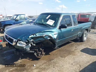 1999 Mazda B-Series Truck SE with VIN 4F4YR16V8XTM06755, listed as a IAAI auction lot 41899934 with 133,171 mi miles and . Bid and sale history available at DreamBid. Image 2.