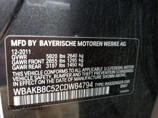 2012 BMW 7 Series 750Li with VIN WBAKB8C52CDW84794, listed as a Copart auction lot 49874315 with 118,725 mi miles and Salvage Title. Bid and sale history available at carsss.com. Image 14.