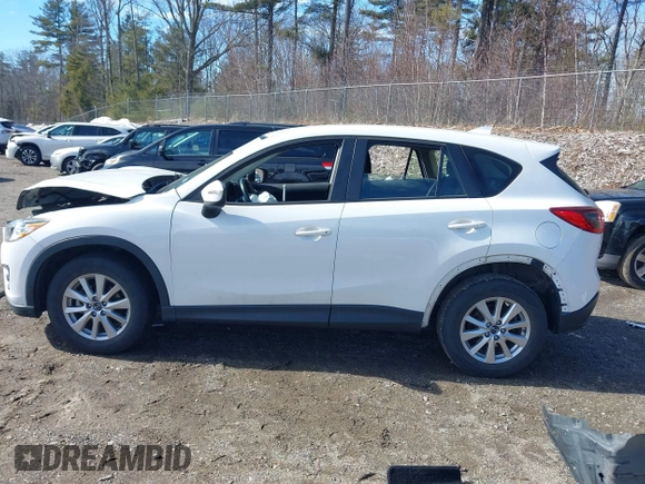 2016 Mazda CX-5 Sport with VIN JM3KE2BY9G0887110, listed as a IAAI auction lot 41761039 with 86,624 mi miles. Bid and sale history available at carsss.com. Image 15.
