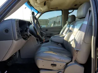 2004 GMC Yukon SLE with VIN 1GKEK13V24J236327, listed as a Copart auction lot 76896974 with 151,028 mi miles and Salvage Title. Bid and sale history available at carsss.com. Image 7.