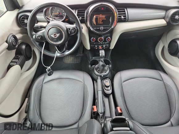 2015 MINI Hardtop 4 Door with VIN WMWXS5C5XFT831555, listed as a Copart auction lot 61673485 with 104,120 mi miles and Salvage title. Bid and sale history available at DreamBid. Image 8.