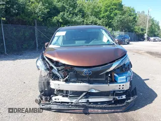 2021 Toyota Sienna LE z VIN 5TDKRKEC0MS062918, wystawiony jako IAAI lot #42382540 z przebiegiem 54 271 mil mil oraz . Historia ofert i sprzedaży dostępna na DreamBid. Obrazek 13.