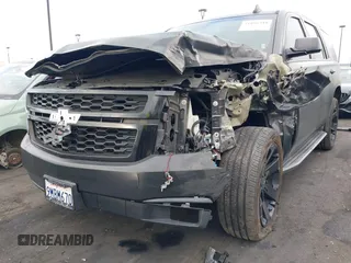 2018 Chevrolet Tahoe LT with VIN 1GNSCBKC5JR126474, listed as a IAAI auction lot 41896310 with 90,928 mi miles and . Bid and sale history available at DreamBid. Image 6.