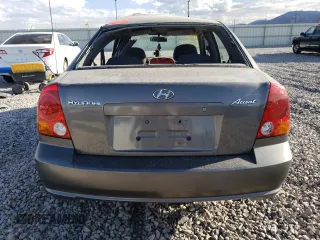 2003 Hyundai Accent GL with VIN KMHCG45CX3U482360, listed as a Copart auction lot 68657183 with 0 mi miles and Salvage Title. Bid and sale history available at carsss.com. Image 6.