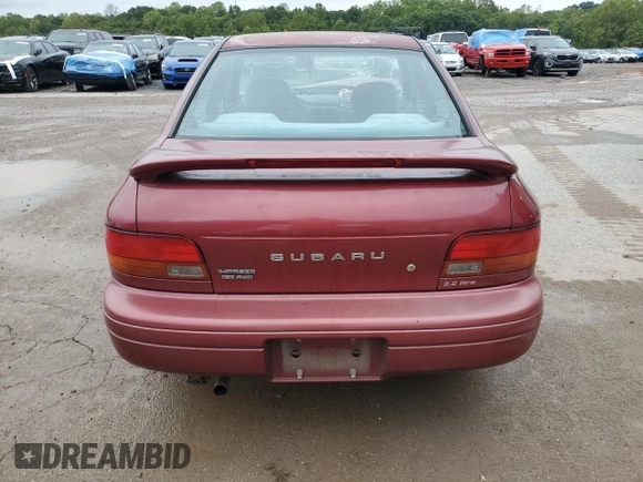 1996 Subaru Impreza with VIN JF1GC4557TH512593, listed as a Copart auction lot 74099464 with 112,437 mi miles and Salvage title. Bid and sale history available at DreamBid. Image 6.