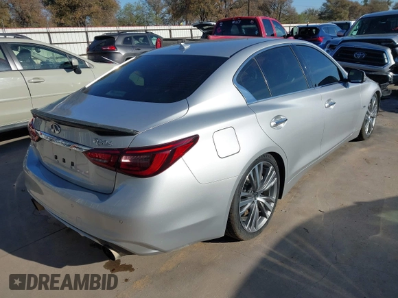 2019 Infiniti Q50 Luxe z VIN JN1EV7AP4KM518705, wystawiony jako IAAI lot #40957491 z przebiegiem 49 576 mil mil oraz . Historia ofert i sprzedaży dostępna na DreamBid. Obrazek 4.