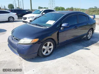 2008 Honda Civic Sdn EX with VIN 1HGFA15858L052702, listed as a IAAI auction lot 42031789 with 235,312 mi miles. Bid and sale history available at carsss.com. Image 2.