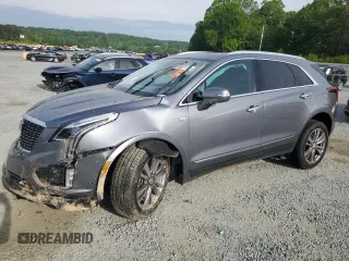 2021 Cadillac XT5 FWD Premium Luxury with VIN 1GYKNCRSXMZ172998, listed as a Copart auction lot 54337175 with 48,429 mi miles and Salvage title. Bid and sale history available at DreamBid. Image 1.