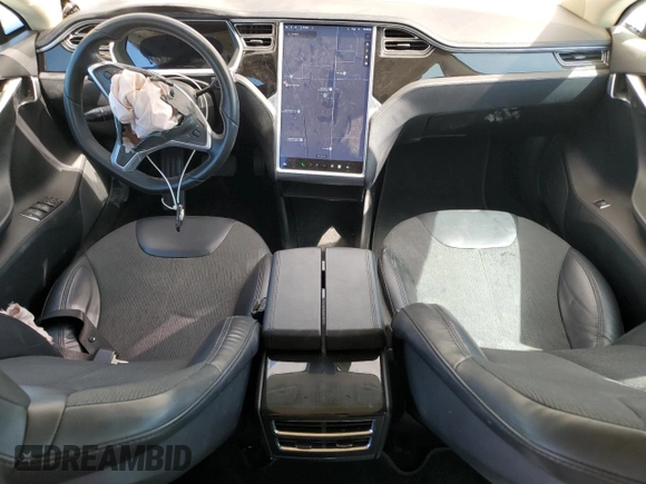 2013 Tesla Model S with VIN 5YJSA1AC9DFP10400, listed as a Copart auction lot 64096555 with 165,166 mi miles and Salvage title. Bid and sale history available at DreamBid. Image 8.
