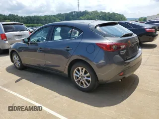 2015 Mazda 3 i Touring with VIN JM1BM1L74F1255247, listed as a Copart auction lot 60755455 with 102,554 mi miles and Salvage title. Bid and sale history available at DreamBid. Image 2.