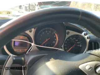 2014 Nissan 370Z Touring with VIN JN1AZ4EH8EM631324, listed as a Copart auction lot 85573524 with 0 mi miles and Salvage Title. Bid and sale history available at carsss.com. Image 9.