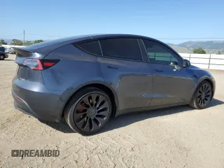 2022 Tesla Model Y Performance with VIN 7SAYGDEFXNF521502, listed as a Copart auction lot 56132745 with 73,339 mi miles and Salvage title. Bid and sale history available at DreamBid. Image 3.