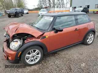 2012 MINI Hardtop with VIN WMWSU3C56CT254253, listed as a Copart auction lot 52648365 with 79,315 mi miles and Salvage title. Bid and sale history available at DreamBid. Image 1.