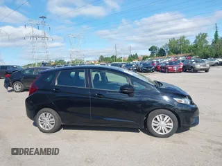 2015 Honda Fit LX with VIN 3HGGK5H51FM777364, listed as a IAAI auction lot 42297673 with 139,813 mi miles and . Bid and sale history available at DreamBid. Image 13.