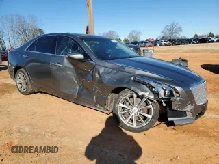 2017 Cadillac CTS Luxury AWD with VIN 1G6AX5SX9H0133510, listed as a Copart auction lot 87673055 with 106,797 mi miles and Salvage title. Bid and sale history available at DreamBid. Image 4.