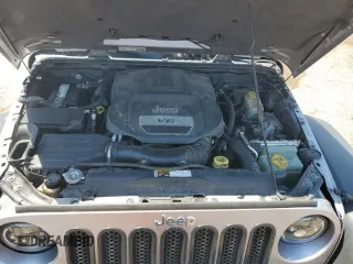 2014 Jeep Wrangler Unlimited Rubicon with VIN 1C4HJWFG1EL241014, listed as a Copart auction lot 63948655 with 165,650 mi miles and Salvage title. Bid and sale history available at DreamBid. Image 11.