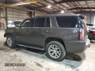 2020 GMC Yukon SLT Standard Edition with VIN 1GKS2DKC5LR286112, listed as a Copart auction lot 82692994 with 87,959 mi miles and Salvage Title. Bid and sale history available at carsss.com. Image 2.