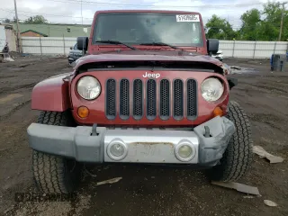 2008 Jeep Wrangler Sahara with VIN 1J4FA54178L566037, listed as a Copart auction lot 61439685 with 115,812 mi miles and Salvage title. Bid and sale history available at DreamBid. Image 5.