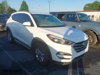 2018 Hyundai Tucson SEL with VIN KM8J3CA40JU737848, listed as a IAAI auction lot 41993190 with 165,465 mi miles. Bid and sale history available at carsss.com. Image 1.