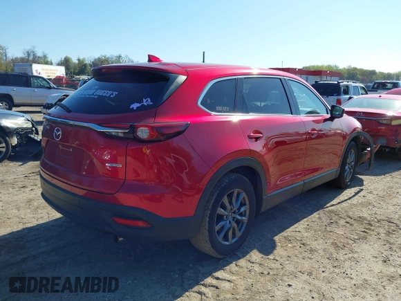2020 Mazda CX-9 Touring z VIN JM3TCBCY6L0401324, wystawiony jako IAAI lot #41973626 z przebiegiem 53 891 mil mil oraz . Historia ofert i sprzedaży dostępna na DreamBid. Obrazek 4.