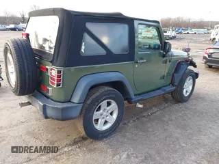 2016 Jeep Wrangler Sport with VIN 1C4AJWAG7GL330159, listed as a IAAI auction lot 41530415 with 98,554 mi miles and . Bid and sale history available at carsss.com. Image 4.